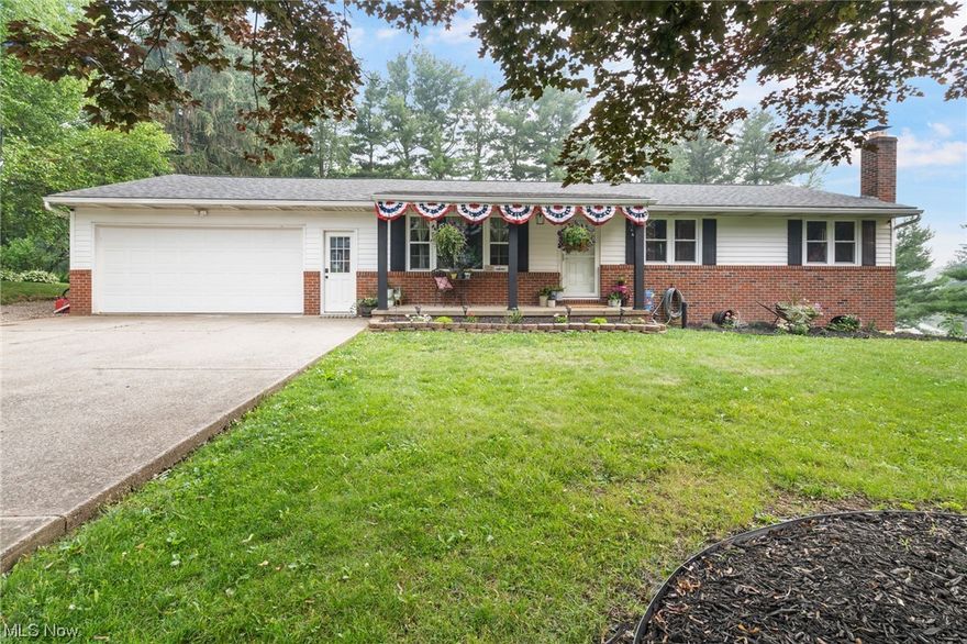 Welcome to your dream home! Nestled in a serene neighborhood, this stunning 5 bedroom walkout basement ranch home embodies the essence of quintessential Americana.  The main level showcases a beautifully crafted kitchen adorned with Amish-built maple cabinets, complemented by quartz countertops and the warmth of oak hardwood floors. Adjacent to the kitchen, an inviting eat-in area opens up to a 4-season
 room, offering a panoramic view of the fenced-in yard. Watch with joy as children and pets frolic in the safety of this enclosed space. From the 4-season room, step out onto the expansive multi-level deck, providing ample space for hosting gatherings. On the main level, you'll find 3 of the 5 bedrooms, each offering a peaceful retreat. The owner's suite features a private full bathroom, ensuring comfort & convenience. Journey downstairs to the lower level, where you'll discover a conveniently located laundry area & 2 additional bedrooms, perfect for accommodating guests or creating a