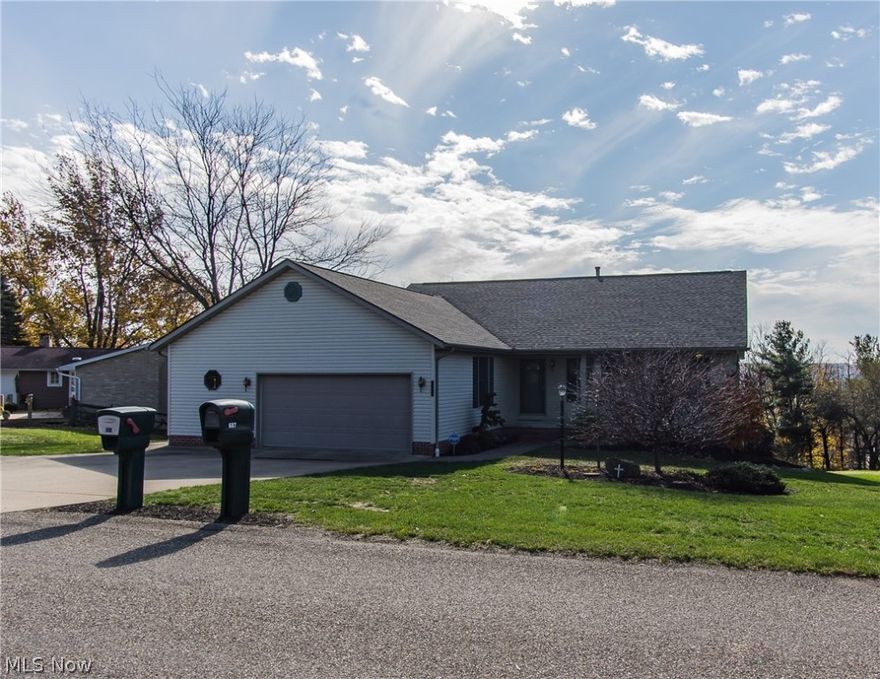 One Owner Immaculate Brick Ranch Nestled On .55 Acre Lot In Wilkshire Hills!  This Open Concept Has All One Floor Living Including First Floor Laundry. Easy Access Covered Front Porch Invites You Into Foyer w/Hardwood Flooring & Coat Closet For Guests. Living Room With Cozy Custom Brick Fireplace/Wood Burner & Windows On Each Side For Much Natural Lighting. Spacious Eat In Kitchen With Plenty Of Counter Space, Custom Cabinets, Newer Appliances, Bayed Windows & Private Deck w/Slider Doors To Cook Out Or Relax & Look Out Over The Beautiful Valley Views Of Bolivar. First Floor Laundry. Master Bedroom With Private Deck, Walk In Closet & Full Bathroom. Ample Sized Second & Third Bedrooms With Full Bathroom. Full Walk Out Unfinished 13 Course Basement Is Plumbed For Bathroom & Would Be Easy To Finish. Vacuflow For Easy Cleaning. Attached Two Car Garage. Updates Include: Roof 3 Years Old, Water Heater 1 Year Old, Furnace & Central Air 3 Years Old. Some Flooring.