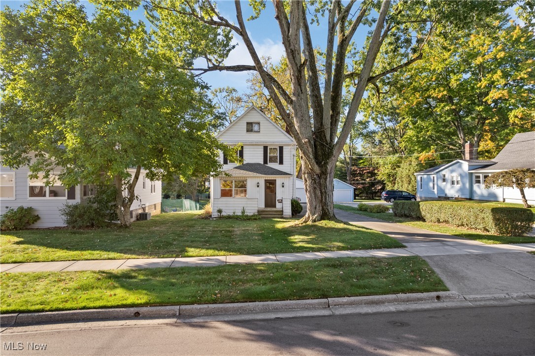 Adorable home with endless potential! This charming Cuyahoga Falls residence features a spacious layout, classic character, and plenty of room to make it your own. Inside, you’ll find a formal dining room and a cozy living room with a welcoming fireplace—perfect for gatherings or quiet evenings in. The kitchen opens to a large family room showcasing a striking brick fireplace and vaulted ceilings, creating a warm and inviting atmosphere. Sliding doors lead to a low-maintenance Trex deck overlooking the backyard, where you can enjoy occasional visits from local wildlife. Upstairs, the home offers 3 bedrooms and a full bath, while the huge finished attic on the third floor provides incredible versatility—use it as a 4th bedroom, office, or playroom. The attic’s windows fill the space with natural light, and built-in storage adds practicality. Additional highlights include a charming enclosed porch, bay window, and built-in features throughout. Mechanical updates bring peace of mind, with a 90% efficiency Carrier furnace (’22), central air (’15), and a roof approximately 10 years old. The oversized garage and partially finished basement–with glass block windows–add even more space full of potential. Just minutes from the Cuyahoga River and Gorge Metro Park, where scenic hiking and walking trails await. Conveniently located near Rt. 8, shopping, dining, and entertainment, with easy access to both Akron & Cleveland. Sold as is, this gem is ready for your vision and creativity!