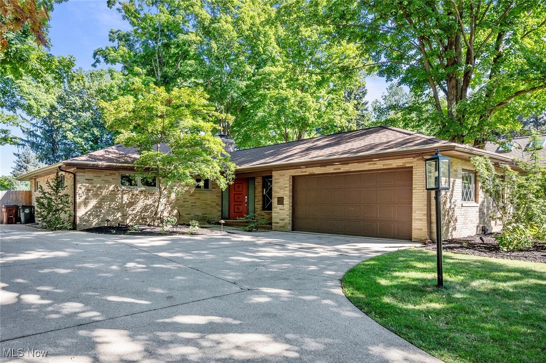 Meticulously maintained and tastefully updated inside and out, this Westlake ranch is sure to impress! Nestled on over half an acre of a park-like setting, this stunning home boasts 3 bedrooms, 2 full bathrooms and nearly 1700 square feet. Not only is this home beautifully remodeled, all of the major mechanicals have been replaced within the last few years! This is truly a move-in ready home. As you enter through the front door you will be greeted by plenty of natural light and beautiful laminate flooring that flows throughout the living and dining rooms, hallway and family room. The recently remodeled kitchen (2019) features white cabinetry and stainless steel appliances. The cozy family room features a fireplace and amazing views into the backyard. The master bedroom features two large closets and a gorgeous en suite with a walk-in tiled shower (2021). Two additional generously sized bedrooms and a beautiful guest bathroom (2019) complete the main level. The basement provides additional space for entertaining, a home gym, and a nice clean laundry area. Outdoor entertaining is a breeze with 2 patios and fresh landscaping. The fenced in backyard also features a large shed. The 2 car attached garage has a durable epoxy coating (2022). The driveway also features an extra parking pad. Too many updates to list, but some include All Windows and Sliding Glass Door (2019), Furnace (2021), AC (2019), Roof (2019), Tankless Water Heater (2024), Radon Mitigation System (2024), Brick Patio (2020). Located just minutes away from parks, golf courses and shopping and only a short drive to Lake Erie's shoreline!