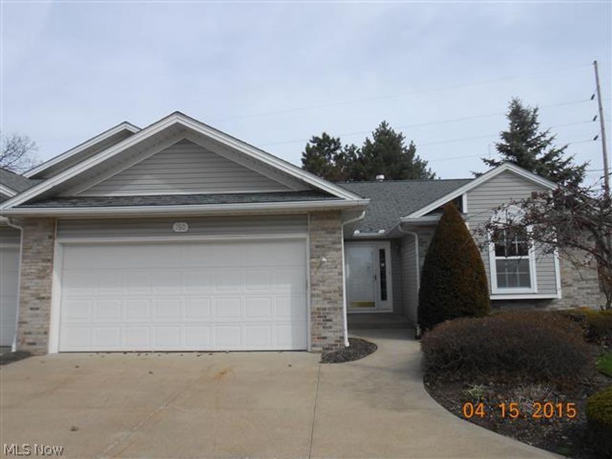 Attractive end-unit with great room with cathedral ceilings and gas fireplace, slider to rear wood deck, kitchen opens to great room and has a dinette area, master bedroom with master bath plus large 2nd bedroom, full basement, attached 2 car garage, and first floor laundry area.  Equal Housing Opportunity.  Sells As Is.