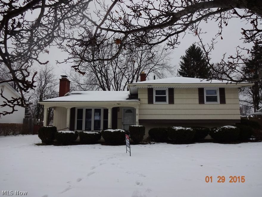 HUD Case #412-535918. As-Is Sale. Seller Will Not Make Repairs. Buyer Is Responsible For Utility Activation For All Inspections/Appraisals. Buyer Is Also Responsible For Correction and Any Required Escrow For All POS Violations. FHA Uninsured. Equal Housing Opportunity. Enjoy Cold Winter Days By The Fireplace In The Living Room Of This Charming Home. You Will Love The Newer Kitchen Cabinetry and Hardwood Flooring. The Home Also Has Newer Windows. The Detached Garage Is Oversized and Includes a Storage Area.