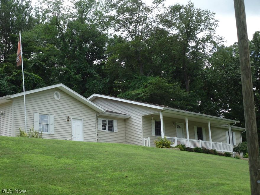 Open ranch. Vaulted family room with gas fireplace. Newer neutral carpet. Large eat-in kitchen with breakfast bar, appliances, ceramic tile floors. Kitchen appliances newer - refrigerator 2013, stove 2014. Updated light fixtures. Open oak staircase in family room leads to lower level - easily finished. Wide hallways and foyer. Formal dining room. Large bedrooms. Master bedroom and bath. Newer patio. Private setting on a low traffic street. Close to Rt. 36 & I-77. Convenient location. 15 minutes from Coshocton, Cambridge, Uhrichsville/Dennison and New Philadelphia.  Subject to home sale.  Continue to show.