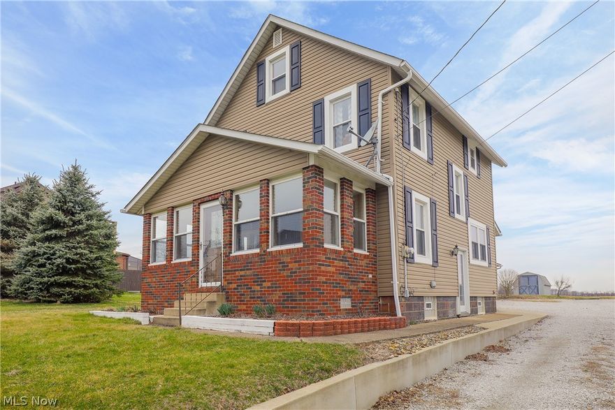 Beautifully remodeled home in Marlington Local School district. Featuring a stunning fully renovated Eat In Kitchen, including Amish custom cabinetry, stainless steel appliances and ceramic tile floor. Oversized Living room with hardwood flooring and huge windows. Enjoy the country views in the enclosed Sunroom. Fully finished 3rd floor that makes a great additional living space or Bedroom. Detached 3 car garage with ample room for all of your recreation vehicles, lawn equipment and plenty of extra storage space. All mechanical systems have been upgraded. Move in ready!!