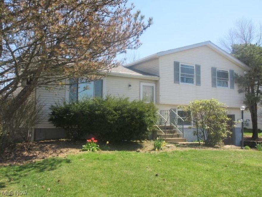 Must see this nice 3 bedroom split level, attached garage and more