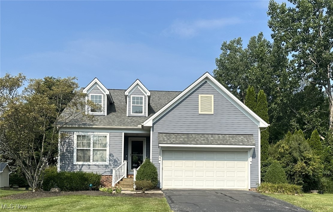 Charming colonial in a lovely neighborhood. This property sits on a 1/2 acre of beautiful land. Lovely extended deck for outdoor fun and entertaining. This property was build in 1997 and it was the model home with all the extra features: Gas fireplace, large utility room on the main level, built in speakers, gas fireplace, built in vacuum system, wainscoting and spectacular tray ceilings. Excellent school system close to Route 2, Route 90 and the wonderful Lake Erie Bluffs. Newer roof put on in 2022 and newer siding from 2024.