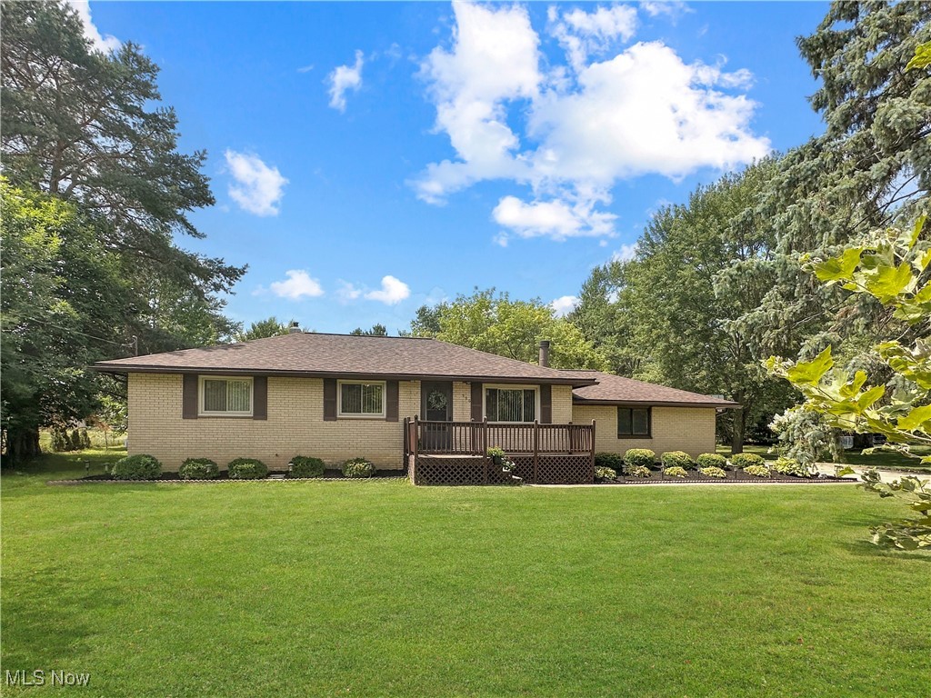 Welcome to 596 Hadcock Rd! With well over half an acre, this yard is sure to impress. You'll love having both front and back decks with tons of room to entertain outside! Inside, you'll enjoy the living room with cozy wood-burning fireplace in the cooler months, an eat in kitchen with all appliances, and new carpeting throughout the 3 bedrooms. Kitchen and bathroom flooring was recently updated as well. Buyers will have peace of mind knowing that the roof was just replaced last month and the basement was fully water-proofed this month! Both have transferrable warranties. Windows replaced in 2022. Home is being sold as-is, but sellers are offering a 1yr home warranty from America's Preferred as an added bonus! Schedule your private showing today!
