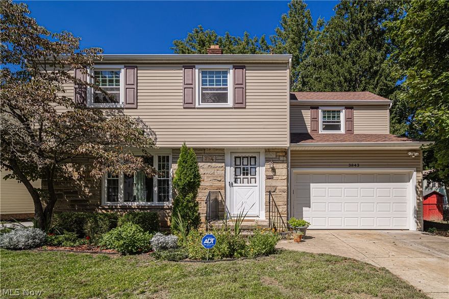 Come make this spacious, well-maintained South Euclid colonial your new home! Step inside and feel welcomed by the charming hardwood floors that flow throughout the large living room and into the dining area. The kitchen is equipped with plenty of counter and cabinet space as well as all appliances! There is an addition off the kitchen and dining room that provides ample living space and could be used as a second family room. Upstairs find four sizeable bedrooms and a full bath. There is access to additional attic storage as well! The basement is partially finished and provides plenty of space for both recreation and storage. The 1.5 car garage has a garage door in the front and a garage door in the back that opens up to a patio and the fully fenced-in backyard. Home warranty included! This charming, move-in-ready home is ready for it's new owners to enjoy!