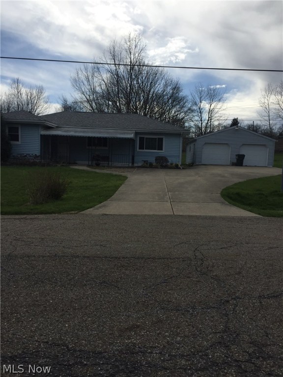 Charming ranch in a quiet setting in Green, Ohio. Everything you need on one floor.
Full basement with Rec Room and shower plus lots of storage space.
Large 2-1/2 - 3 car garage, paved drive and beautiful backyard view as you sit on the back porch.
Spacious dining room and updated kitchen. Spacious living room with access to back porch.
Convenient to stores, highway, parks, schools and more.
Just move in and make it your own.
