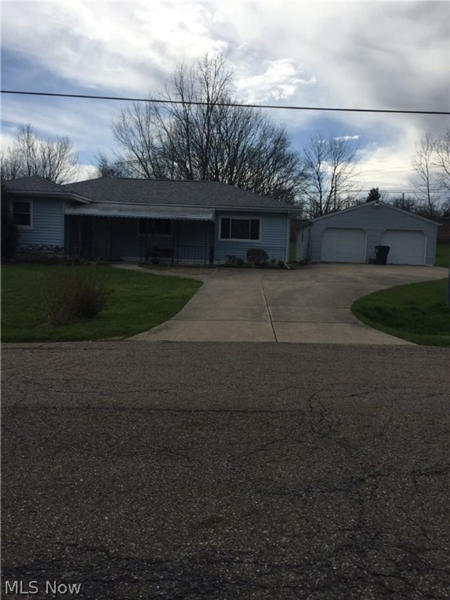 Charming ranch in a quiet setting in Green, Ohio.  Everything you need on one floor. 
Full basement with Rec Room and shower plus lots of storage space.
Large 2-1/2 - 3 car garage, paved drive and beautiful backyard view as you sit on the back porch.
Spacious dining room and updated kitchen. Spacious living room with access to back porch.
Convenient to stores, highway, parks, schools and more.
Just move in and make it your own.