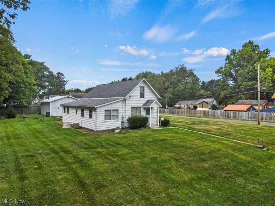 This 1 1/2 story, 3 bed offers 1 ½ baths on the main level as well as a full bath in the basement. The second level displays 2 bedrooms, and an extra room which could have a variety of uses such as another tv room. On the main level there is a wonderful three seasons room with windows surrounding the entire room. This corner lot gives the home room and privacy. One of the highlights of the property is the extra-large detached garage. One of the garage doors is fitted with a large full size RV door making this space great for a boat or RV owner. The garage has ample room, aside from the two car spaces, making this garage/pool barn perfect for a wood shop, mechanical work space or simply another entertaining space. The home generator located outside is included.The home is sold ''as is''