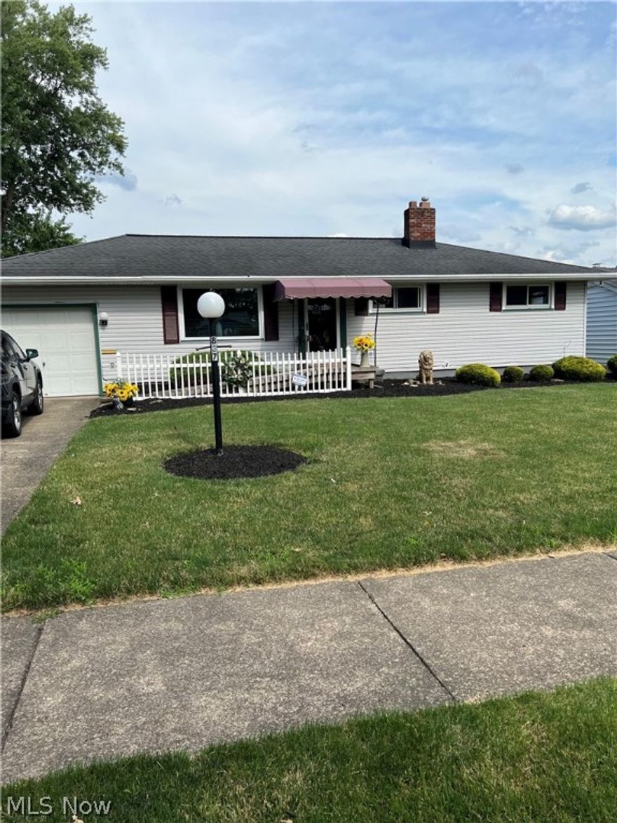 Quaint little ranch on a quiet street. Beautifully manicured landscaping invites you into this well kept home. Under the floral carpets you will find Hardwood floors, which runs throughout the livingroom and bedrooms. Some of the main items that have been updated, roof is 3 dimension shingles, vinly replacement windows and glass block in the basement. HVAC is a little older, but has been well maintained and runs great. Step outside to your own little paradise with a fully fenced in yard with mature landscaping. Relax in the sun on the new open deck or step under the covered patio for some shade. Don't let this one slip away.