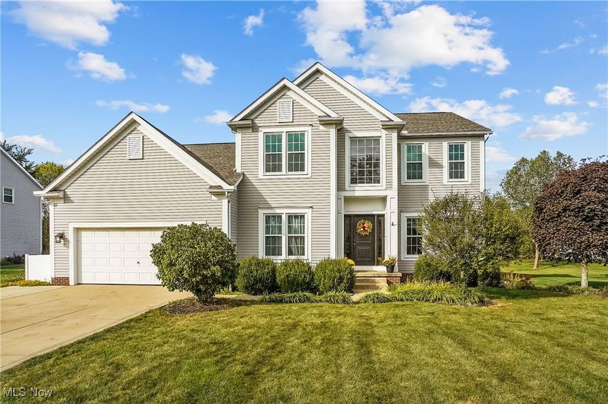 Welcome to this stunning colonial in the Hannum Crossing community of Streetsboro. Set on just over a half acre, this 5-bedroom, 3.5-bath home delivers generous living space with a contemporary palette and thoughtful updates. A two story foyer with an updated front door opens to a first floor designed for everyday ease: a private office, formal living and dining rooms, a convenient half bath, and first-floor laundry. The vaulted family room with a gas fireplace flows to the kitchen and out to your backyard retreat. Upstairs, the primary suite features vaulted ceilings, an updated bath with a walk-in shower, and a walk-in closet, while the additional bedrooms are bright and well sized. The finished lower level adds 600+ sq ft with a full bath, flexible bedroom/gym space, and a large storage room. Outside is built for entertaining: a covered deck with a steel roof, a stamped concrete patio, a concrete basketball court, plus a shed and 7- person hot tub. Recent improvements include updated windows, refreshed flooring, a water softener, newer furnace, central air, and hot water tank. Minutes to I-80/I-480 and about 10-15 minutes to Kent State. With an unbeatable location near Tinker's Creek State Nature Preserve, local parks, golf, shopping, and highways, this home offers the perfect balance of convenience, space, and style. Don't wait, call to schedule your private showing today.