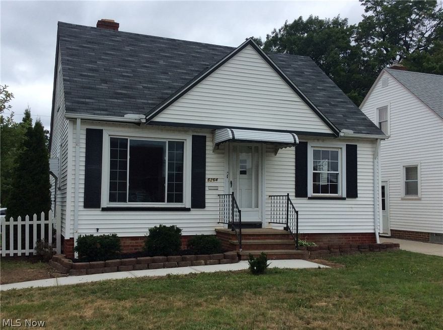 Welcome home to this updated, immaculate, and ready to move in Cape Cod.  This home features a brand new kitchen with stainless steel appliances and new laminate flooring throughout.  There are two bedrooms on the first floor and a large master bedroom on the second floor complete with new carpeting! Partially finished basement gives you extra living space!  Enjoy entertaining in the fully fenced backyard which includes a covered patio and a two car garage!  Updates include new furnace and AC replaced in 2013, new driveway, and vinyl windows throughout! JUST TURN THE KEY! Schedule your showing now!