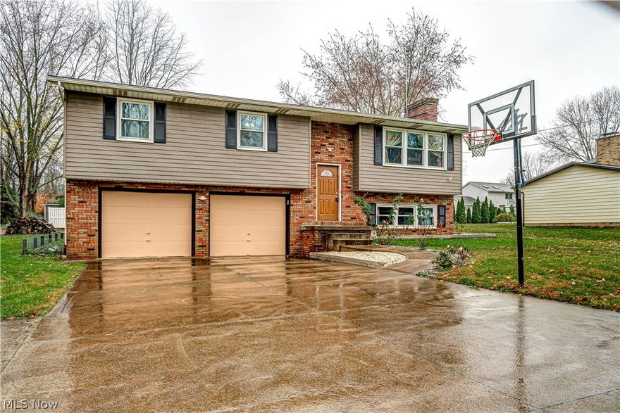 New to the market in Jackson twp, ideal location just seconds away from Strausser Elementary.  Step through the front door into the bright foyer.  On the main level, the flooring has been upgraded to luxury vinyl in the living room and hallway.  The dining room has a sliding glass door to access the large back deck overlooking the private backyard.  Off the dining room, the kitchen has plenty of cabinetry and newer tiled floors.  Down the hall, you'll find a full bathroom and 3 nicely sized bedrooms including the master suite with dual closets and a full ensuite bathroom (currently being used as a home office).  Downstairs, the family room makes for a great place to entertain.  It is presently soundproofed making it perfect for a theater or music room.  There is access to the extra deep 2-car attached garage off the utility room.  Other updates include; Furnace (with new humidifier) & A/C 2003, new front door, updated electrical wired for a generator, water heater 2010, new windows 202