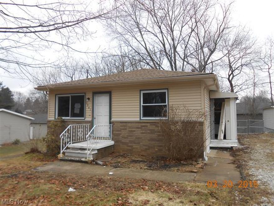 Attractive Lakemore Village ranch, fenced-in backyard, open kitchen-dinette combo area, hardwood floors throughout, 3 nice size bedrooms, finished rec room in the basement, quiet, dead-end street.  Equal Housing Opportunity.  Sells As Is.  Contingent upon Seller signed documents.