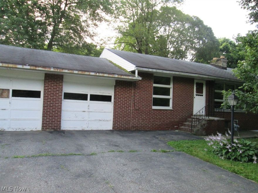 Spacious ranch which includes rec room with full kitchen and bath. 2 car attached garage with a large lot. This is a Fannie Mae Property.