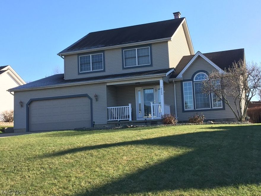 Beautiful modern 2 story with lots of features located in one of Austintowns finest developments. Great kitchen with large center  island with Quartz tops and ceramic back splash & floors that opens to family room with fireplace, bay window and surround sound throughout the house. Unique Cathedral ceiling with open beam in living room/dining room with Bamboo floors! Master bedroom with master bath. Finished 12 course basement with wet bar, exercise room/office and half bath. New storm door & vinyl railing on front porch. The back yard is outstanding with its 2 tiered deck and patio surrounding a beautiful above ground pool with spacious shed and new fenced yard. All of this on a quiet Cul de Sac street. Priced to sell!