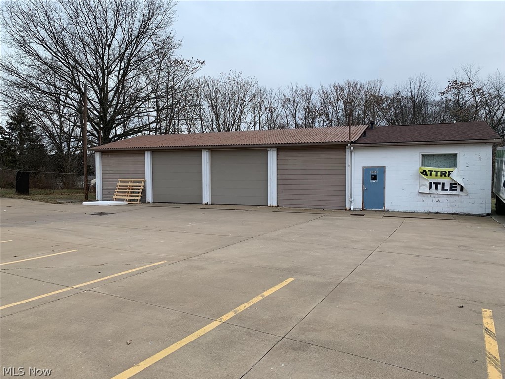 Office Space with 4 overhead doors. Owner pays for snow, trash, mowing and water.