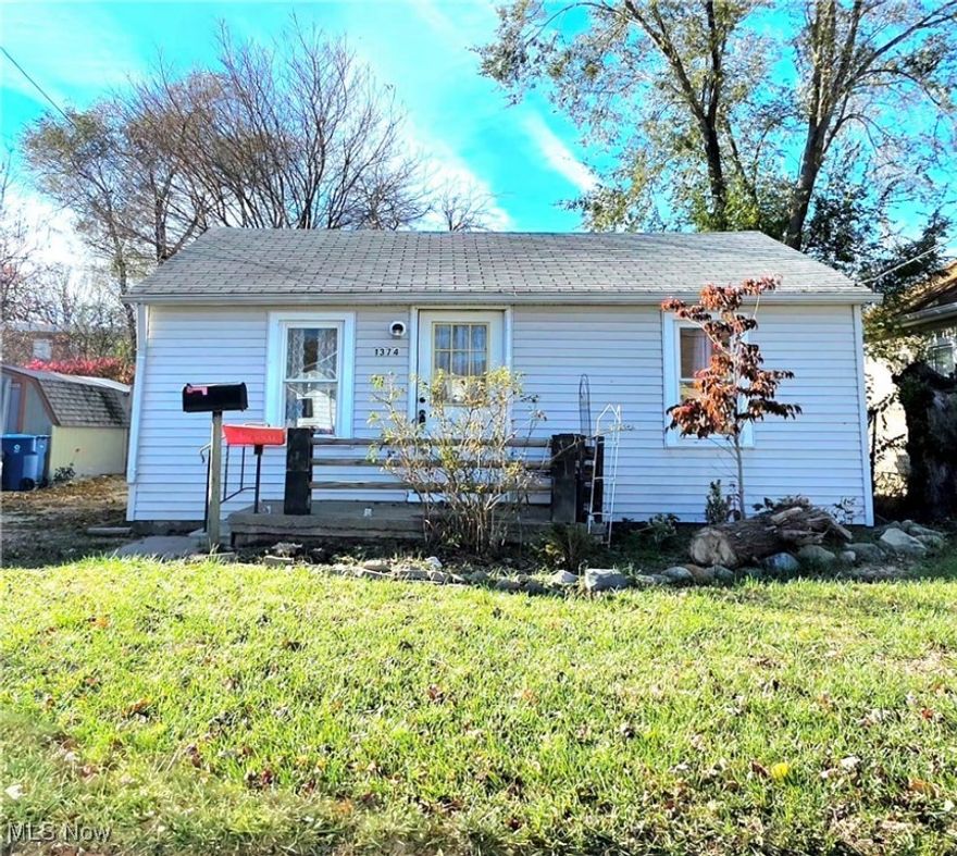Welcome HOME to 1374 Nichols St in Lorain! A charming and move-in-ready 2-bedroom, 1-bath ranch offering the ease of single-floor living! This home features a 1-car garage and numerous updates throughout, including fresh paint, new flooring, updated cabinets and countertops, as well as a newer roof, water heater and appliances. Enjoy the convenience of a fenced-in backyard, perfect for pets, outdoor dining, or simply relaxing. Ideally located near Lake Erie, Lakeview Park, and several marinas, this property offers both comfort and proximity to the water. A great opportunity for first-time homebuyers or investors looking for a well-maintained, low-maintenance home in a desirable area! All appliances stay, so all you have to do is MOVE IN!