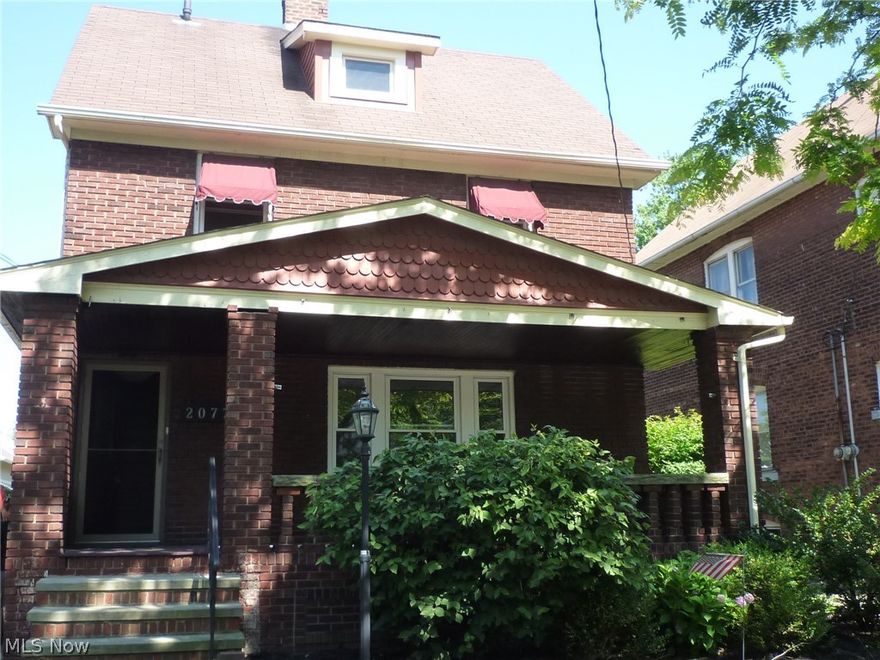 You will love the character in this front porch colonial. From the wood trim to the beautiful built in cabinets in the dining room this home is filled with charm. This home boasts new windows (2012) an updated kitchen with appliances and hard wood floors throughout. Although currently a two bedroom house the master bedroom could easily be transformed back into two rooms for a third bedroom or office space. The private back yard is fenced in and features a patio to enjoy your morning coffee surrounded by beautiful landscaping. Rec room with glass block windows. Loads of storage. Walking distance to a park, shops and restaurants and mins to I-90.  Home warranty provided!