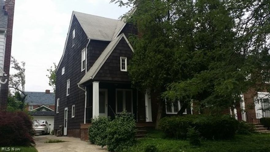 Single Family Colonial home  4 bedrooms 1.5 bathrooms.  Hardwood and Carpet throughout the home.  2 car detached garage