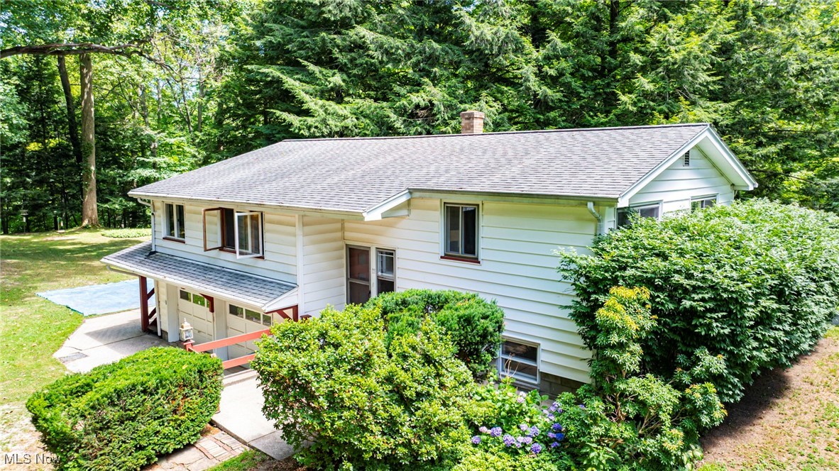 Nestled away 400 feet from Howard Rd and cradled on three sides by a lush ravine, this stunning Ashtabula Township property offers a rare blend of privacy, natural beauty, and modern convenience, all while located just 1 mile from I-90 and within 10 minutes of shopping, restaurants, and everyday conveniences.
Inside, you'll find a thoughtfully updated bi-level home originally built in 1965 and meticulously maintained since. The newly remodeled luxury bathroom (2024) features heated marble floors, a custom tile shower, and premium finishes that rival any spa.
With 2 official bedrooms and flexible living spaces, the home can easily accommodate up to 4 bedrooms. The finished basement and a detached bonus room (121"×174") offer the perfect setup for guests, a creative studio, or a dedicated remote office.
Additional features include: an attached heated 2-car garage, along with city water, natural gas heating, and gigabit internet for seamless modern living. Recent updates from 2021 to 2025 include a remodeled basement and bathrooms, new washer, dryer, and dishwasher, a built-out attic, extensive electrical upgrades, a new garage door opener, and more.