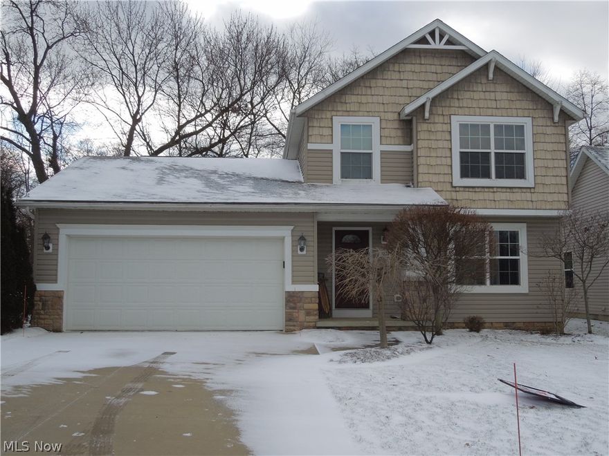 Like new gorgeous colonial style home with open floor plan and first floor laundry!  Brand new carpet throughout the home (2016) and neutral decor. Living room features gas burning fireplace and new carpet. Dining area is perfect for a large table and has a sliding glass door that leads to the backyard.  Master bedroom has it's own full bath complete with a spacious walk in closet and wall organizers. PLUS the basement has a large finished area perfect for a family room, game or play area. The homeowners association fee includes the landscaping, snow and trash removal--so this house is practically maintenance free!  Close to highway and shopping.  Seller is including home warranty for added peace of mind.  Schedule your private showing today before this one is GONE!!