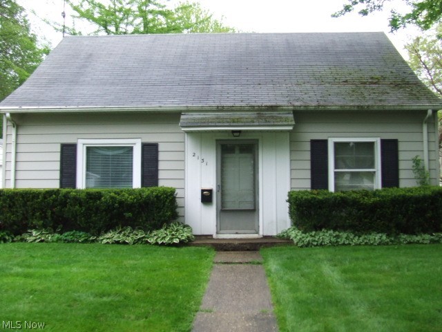 Cuyahoga Falls fixer upper! 4 bed/1bath cape needs some TLC. Two bedrooms on the first floor with the main bath, two more bedrooms upstairs. Eat-in kitchen has oak cabinetry and a utility area houses furnace and water heater. No basement. Garage is a one and a half car that is extra deep and has storage above. Covered Patio. Sold "as is".