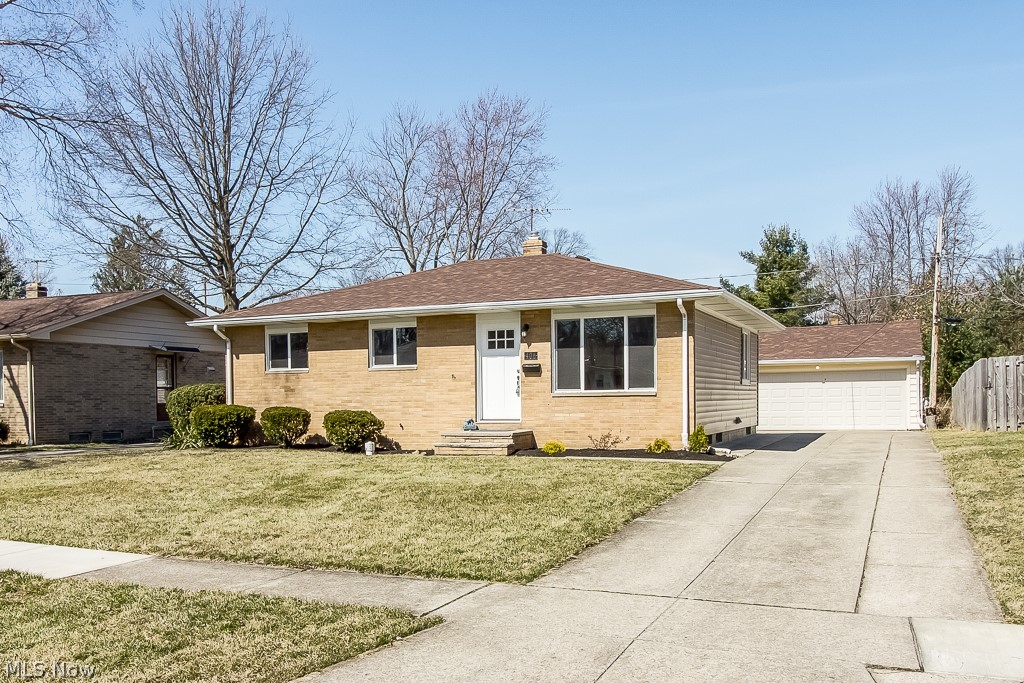 Move right into this well cared for & nicely updated 3 bedroom 1 1/2 bath ranch home. This property features an updated eat-in kitchen with granite counters, tile backsplash & new flooring. The main living area feature refinished hardwood floors throughout living room & all bedrooms. A full bath with granite counter, updated fixtures, tile floor & backsplash. The updated half bath has direct access from the master bedroom. The lower level is finished with a large L-shaped rec room & features separate storage & laundry areas. Additional features & updates include: 2 car garage, new vinyl windows 2019, vinyl siding 2019, complete tear-off roof with architectural shingle 2018, all new interior doors, new exterior front door, updated breaker panel, furnace 2019, AC 2016, H2O tank 2016 & a fully fenced yard with direct access from back door. All Appliances Included!