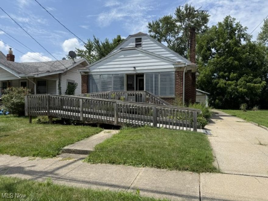 Charming brick bungalow with two full baths and plenty of character, and a double lot! This 2-bed, 2-bath home features a spacious living area with a cozy fireplace, an enclosed front porch perfect for morning coffee, and a full basement offering extra storage or finishing potential. The large 80x114 lot includes a detached one-car garage and room for gardening or outdoor entertaining. Updates include central air, gas heat, and a functional layout with all main living on one floor. Conveniently located in York St Heights near schools, shopping, and quick highway access. Being sold as-is.