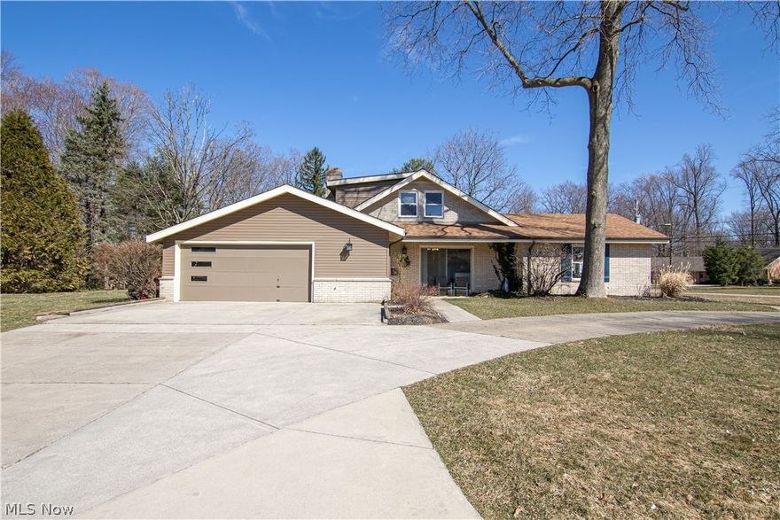 Welcome to 4380 Valley Forge Drive! This Fairview Park home is light, bright, and spacious. Notice the large driveway and front porch as you enter, stepping into the living room with vaulted ceilings. A step up takes you into a wide dining area, perfect for hosting. Make your way into the kitchen, noticing tile floors, an eat-in space, mosaic tile backsplash, and a six-burner stainless gas range. A sliding door offers lots of light and porch access as you make your way down the hall, passing garage access, and a landing zone with extra storage on the way to the half bath. An additional family room is just off the kitchen and leads to a spacious covered porch, great for entertaining. Discover a main-level primary bedroom, with a vanity area and Jack & Jill bathroom, shared with another main level bedroom. Upstairs, discover two additional bedrooms (one with a unique bonus space) sharing a full bathroom. The finished basement offers extra space for recreation, as well as storage and laun