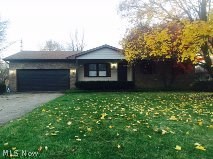 With over 1800 sq ft, this 3 bedroom ranch has so many great features to offer! You are sure to enjoy the heated, attached, two car garage with newer overhead doors, storage and work area. The backyard shed has electric and is wired for cable, HUGE family room with vaulted wood ceilings and beautiful brick fireplace. Eat-in-kitchen is spacious with a breakfast bar and all newer appliances. The bedrooms have generous closet space. full waterproofed basement, covered front porch, brick back patio all situated on a nice street in Boardman schools .