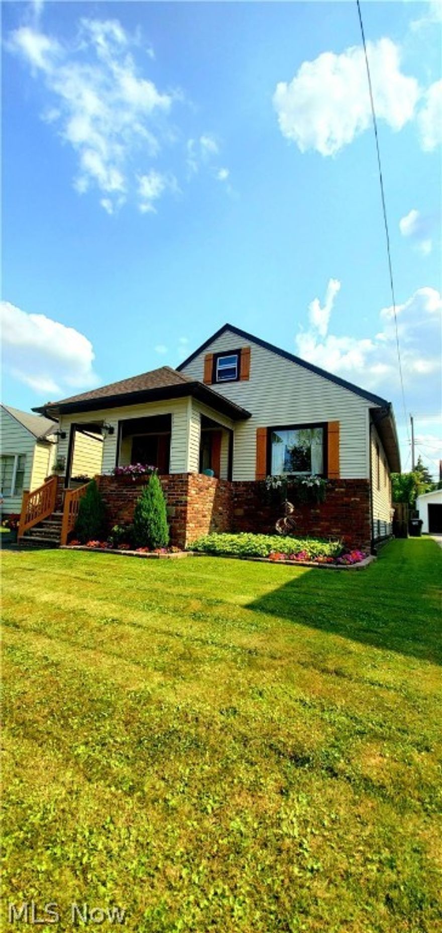 This stunning cape cod is a designer's dream home! Minutes from shopping, parks and I480. The unique, open floor plan is versatile and spacious. Two large bedrooms upstairs with a bedroom on the main floor. The kitchen offers plenty of counter space and ample cabinets for the average cook or gourmet chef. The full sized, open basement has endless possibilities and two large storage rooms.  A perfectly manicured yard is encompassed by a full privacy fence. New retractable awning. Hot water tank installed 2019. New roof with total tear off, gutters and fascia in 2017. POS is complete and violation free. Call your agent before this one is gone.