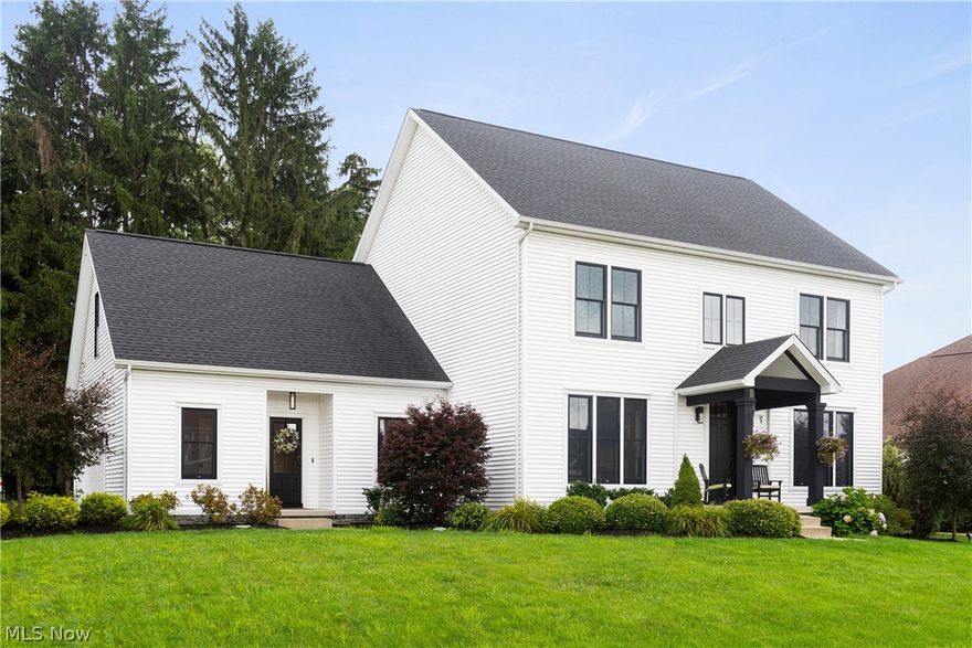 WELCOME HOME! A unique opportunity to purchase a like new home in the "Nicest Place to live in America" according to Reader's Digest. At nearly 4,000 finished s.f., with 9' ceilings on both first and second floors, this custom home boasts upgrades behind every door. Upon entering through the first of two covered entrances, you are greeted to the sunken mudroom with tons of character and built-ins for optimal storage. Laundry is located off the mudroom. The family room and eat-in kitchen are open concept, perfect for entertaining, or enjoying meal preps while being with family. The kitchen, perfect for the amateur chef, features industrial stainless steel appliances, custom hood and designer tile backsplash. With nearly 7' of pantry storage, there is plenty of room for all of your supplies! Rounding off the first floor is a powder room off the main space, dining room and a large home offie, which could also be utilized as a living room, play room or flex space. The foyer boasts a large