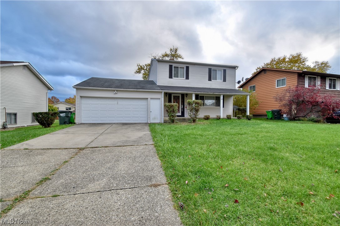 Welcome Home to 24538 Robinia Drive! This beautiful 3 bd 1.5bth colonial with 2 car attached garage and central air boasts tons of space for family and entertaining! Come be blown away by this amazing layout! Entering the home from the front porch you will be greeted by a lovely entryway with a staircase and large coat closet. The first floor includes a spacious living room decorated with sconces, a formal dining area, an eat-in kitchen, a half bath, and a family room with patio doors overlooking the meticulously landscaped backyard which includes a children's playset. Three nicely sized bedrooms and a full bathroom with jetted tub complete the second floor. There is a partially finished basement with a built-in bar and a separate laundry area on the lower level. Schedule your showing today!
