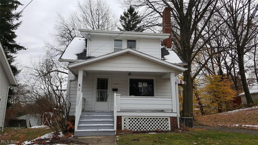 This HUD owned home has been well maintained. Welcoming front porch. Large living room with brick fireplace for cozy nights.  Bedroom on first floor with half bath attached. Two bedrooms on second level with full bathroom.  Partially finished basement. Large yard with detached garage. Extra parcels included in sale. Check the hudhomestore.come for property condition report and available bidding deadlines. It is the buyers' responsibility to conduct due diligence of property condition and verify ALL information in regards to property including but not limited to amenities, utilities, condition, taxes, zoning use or violations, assessments, special assessments and or lot size. Special Assessment of $189.00.