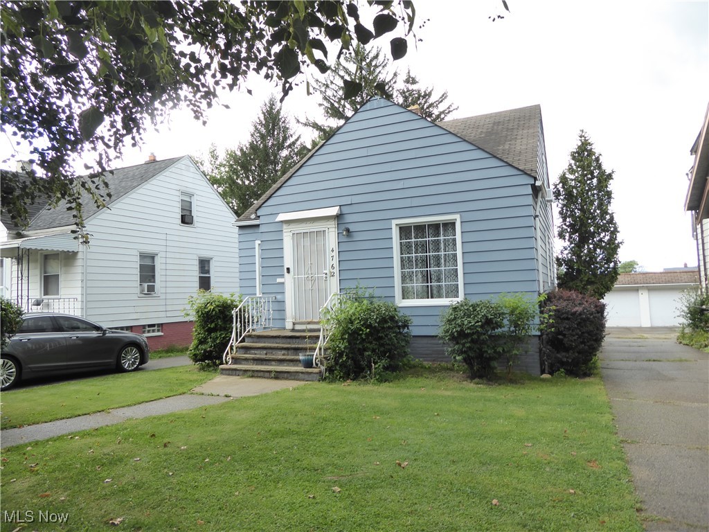 Solid investment opportunity in Garfield Heights! This two bedroom, one bath home offers steady income with a tenant in place paying $1,250 per month through February 2027. The property features wood floors throughout, including the attic, with a block foundation basement for lasting stability. Updates include recently replaced double pane vinyl windows, plus central air for added comfort and efficiency. The full bathroom is finished with ceramic tile, and outside you’ll find a partially fenced backyard along with a large detached garage with a door for one car, storage and workshop. Walk to Garfield Park or ride your bike along the new Garfield Blvd trail connecting into the Towpath trail heading downtown or to the Cuyahoga Valley National Park. Located minutes from Interstates 480 and 77, the property provides easy access to downtown Cleveland, University Circle, the airport, and nearby shopping centers, making it a convenient spot for tenants and a reliable choice for investors.