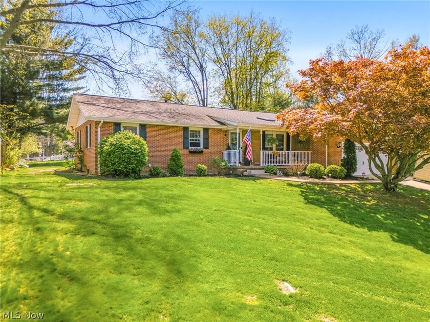 Welcome to 4221 Georgia, a beautifully maintained 4 bedroom, 3 full bath brick ranch, ideally located walking distance to Sippo Lake!  The main level features rich LVT flooring, an updated kitchen with granite countertops, newer appliances, and a bright dining room with skylight.  The open layout is perfect for both everyday living and entertaining, with a cozy gas fireplace in the family room and a spacious primary suite.  The partially finished lower level offers incredible flexibility, including a private guest suite with full bath, large recreation space and a bonus area with a wood burning fireplace, perfect for a home theater, gym, office or generational living.  A dedicated workshop/craft room adds even more functionality for hobbies & projects.  Major updates provide peace of mind, including a newer roof, furnace, central air, hot water tank and a whole-house water filtrations system.  Step outside & enjoy your covered front porch or relax by the above-ground pool in your backyard oasis.  With Sippo Lake's walking trails, marina, and a wildlife preserve just moments away, this home offers both comfort & convenience.  Move in ready and full of opportunity-don't miss your chance to make it yours!