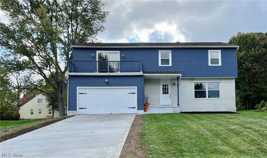 "Wonderfully updated colonial in todays colors and style! Open living with large living areas offers bamboo flooring throughout the main level and newer carpet on 2nd floor and basement. Living room with picture windows opens to the dining room for larger gatherings or cozy dinner parties. Gather in either the sun-filled family room that is bright with whitewashed brick fireplace and sliding doors to the backyard. Inspire the chef in you with awesome kitchen with newer white cabinets, counters, stainless steel appliances, pantry, subway tile backsplash, breakfast bar and desk. 4 spacious bedroom, 2.5 baths are on 2nd floor. Relax in the enormous master suite with access to a balcony, good sized walk-in closet and updated en-suite with walk-in tiled shower. There are 3 generous bedrooms and a full bath which has access to the larger bedroom. Bedroom 2 offers 2 closets and direct access to the remodeled bathroom with tile flooring and shower surround. Relax in the finished rec room on th