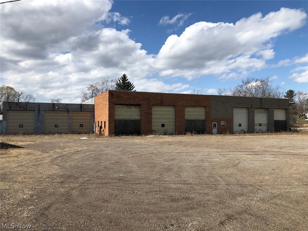 2 Large Commercial Buildings On 2.6 Ac. - 15,000 SF Commercial Bldg. W/ Fire Damage - 4,200 SF Block & Pole Bldgs. – 2.6-Ac. Level Corner Lot - Zoned B-3 Commercial – Live & Online Bidding Available - ABSOLUTE AUCTION, all sells to the highest bidder. ONLINE BIDDING BEGINS MONDAY – MAY 3, 2021 – 11:00 AM and AUCTION LIVE ON-SITE BIDDING WILL BEGIN THURSDAY – MAY 6, 2021 - 1:00 PM. Selling as 1 unit. The property has 2 addresses (6147 Louisville St. & 4175 Fargo Ave.). Former large truck repair garage w/ block construction and steel girder roof. 12 large overhead garage doors total. The deepest bays are approx. 102’. Frame straightener tie downs, overhead beams, office area, and heavy concrete. Look these buildings over. Taxes are $2,212 per half-year. Selling as an entirety. Zoned B-3 Commercial in Nimishillen Twp. NOTE: Nimishillen Twp. has $26,000 for new owner once repairs are made. Call Nimishillen Twp. Zoning for details. Nice level corner lot. All gravel and drainage with ample f