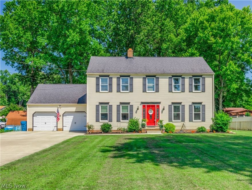 Beautiful and well cared for Colonial home located in the excellent-rated Green LSD!. This lovely two-story home has many updates from flooring, paint, kitchen, bath, etc. As you enter the foyer, you will notice fresh and modern colors throughout. The great room is to the right, followed by a formal dining room. The recently updated eat-in kitchen has beautiful laminate flooring, newer light fixtures, beautiful white cabinets, stainless appliances, granite countertops, tiles backsplash, a wine refrigerator (staying), and a dinette area. Access the 3-seasons room (from the kitchen) and to the private fenced-in backyard with a large patio (20x20) to enjoy and relax. The family room is to the left of the foyer with a wood-burning fireplace, decorative ceiling beams, and plenty of natural light. You will find three bedrooms on the second level, including the master bedroom with a big walk-in closet (6x11), private access to the full bath (w/double sinks), an entranceway to the huge walk-in