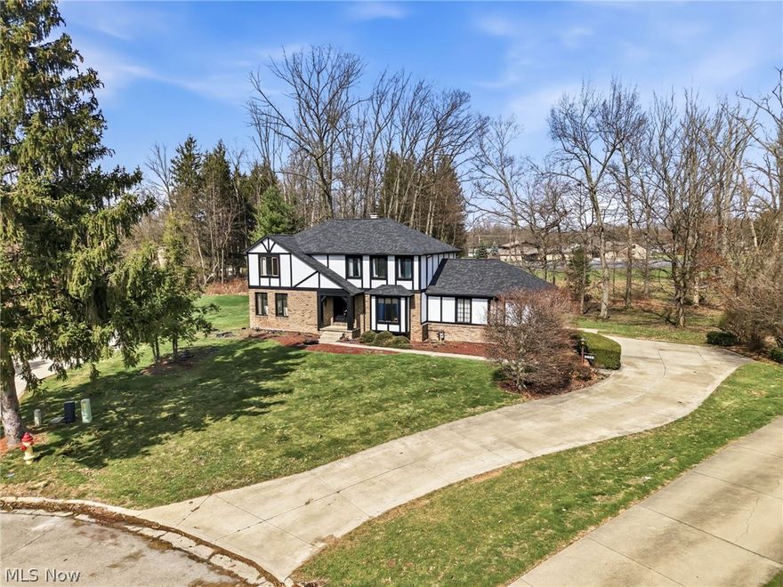 Welcome home through double front doors into a spacious foyer, with a bright living room to the left and a formal dining room to the right perfect for everyday living and special gatherings. The hallway leads to a cozy dinette with a large window overlooking the backyard, while the adjacent family room features the original woodwork, wall-to-wall shelves with cabinets, and double glass doors that open to the patio. This outdoor space offers great potential, whether refreshed as-is or enhanced with a gazebo, providing a perfect hangout with no rear neighbors. Originally built and occupied by a single owner, this home has been meticulously maintained over the years. The kitchen is designed for both connection and function, featuring granite countertops, a breakfast bar with electric cooktop, a large farmhouse sink with backyard views, and brand-new appliances. A convenient half bath, garage access, and multiple entry points to the dining room make daily routines seamless.

Upstairs, the private primary suite includes a walk-in closet and en-suite bath, while three additional bedrooms share a full bath—ideal for family, guests, or a home office. The finished basement adds nearly 900 sq. ft. of living space with a second kitchen and bar, perfect for a rec room or entertaining. Additional space includes laundry, mechanicals, and storage.

Enjoy a heated two-car garage with storage for tools, second attic access, and backyard entry. Located on a dead end quiet cul-de-sac within the Poland School District, this home offers plenty of space to grow, gather, and create lasting memories. Brand new roof and garage doors, painted both interior and exterior, new flooring throughout and many more.