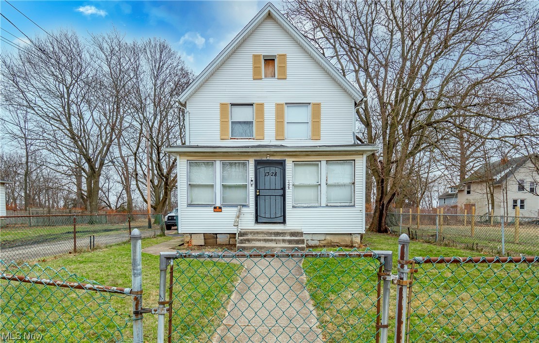 Welcome home to 1328 Saint Elmo Avenue! This home boasts four bedrooms, 1.5 bathrooms, and brand new luxury flooring and carpet throughout. Enter through a sitting area featuring cutouts overlooking a spacious living room with a fireplace. A kitchen, half bathroom, and the first bedroom complete the main level. Venture upstairs to find three more bedrooms and an oversized bathroom.
There is ample storage space and a laundry area on the lower level along with a newer HWT. The exterior features a fenced in yard and a large detached garage. Perfect for first time home buyers or an investment opportunity! Schedule your private viewing today!