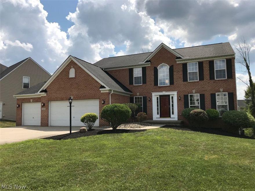 PRICE REDUCED!!! -* OPEN SUNDAY SEPT 8 FROM NOON - 3:00*    4079 GROSS SQUARE FOOTAGE!!THIS INCLUDES FINISHED REC ROOM AND BEDROOM IN BASEMENT WITH WALK IN CLOSET.MSTER BEDROOM HAS BATH AND WALK IN CLOSET.FMILY ROOM HAS FIREPLACE.FORMAL DINING ROOM.WALK OUT BASEMENT.3 CAR ATTACHED GARAGE.SPRINKLER SYSTEM.ALARM SYSTEM.HEATED GARAGE.2 TIRED DECK.PAVER PATIO OFF REC ROOM.GRANITE KITCHEN COUNTER TOPS.GRANITE TOP ON REC ROOM WET BAR.STOVE,WASHER,DRYER,MICROWAVE ,DICHWASHER AND STOVE.GRANITE COUNTER TOPS ON BATHROOM VANITIES.FANS IN UP BEDROOMS,CONCRETE DRIVE.