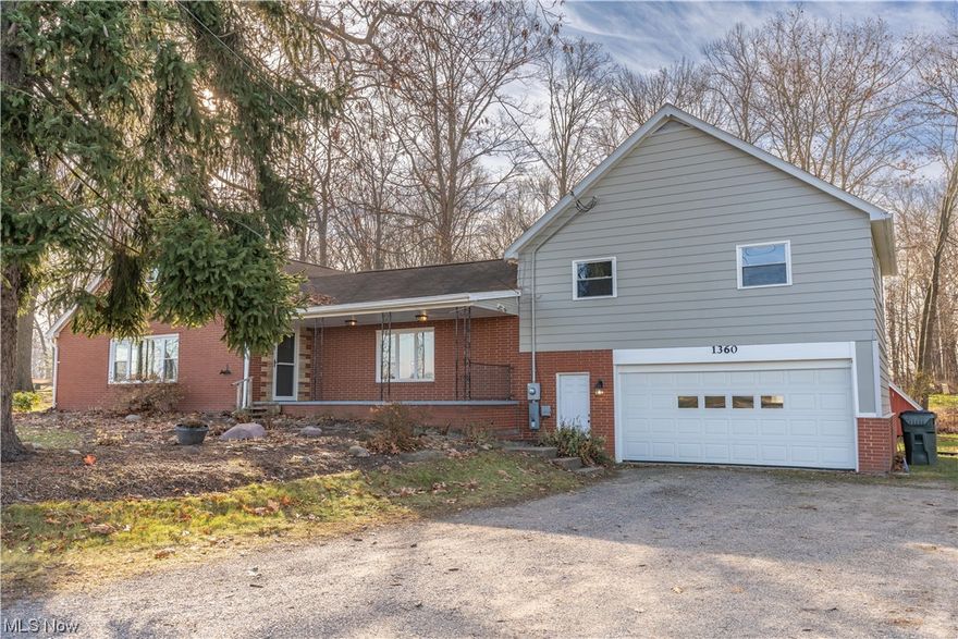 Welcome to this charming 5 bedroom split level home in the heart of Hartville. You have 2 full bathrooms and a full in-law suite above the garage. This property provides ample space for a growing family with a valuable element for multi-generational living or guest accommodations. Do not forget to cozy up by one of the two fireplaces, creating a warm and inviting space for both entertaining and relaxation. Nestled on a wooded lot, the property offers tranquility and connection to nature. Seller is providing a one year home warranty as well with Americas Preferred Home Warranty. Selling the property As-IS