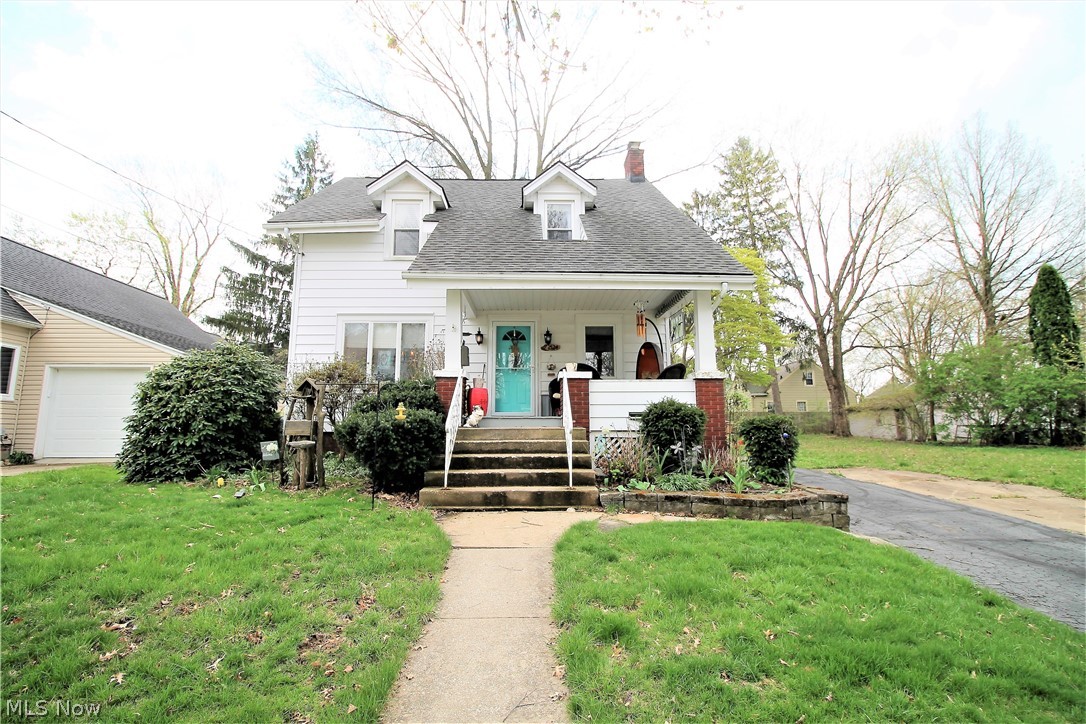 Welcome to this updated three bedroom, two full bath colonial home which radiates with pride and love. Come inside from the fabulous front porch and the new front door. The first floor flows seamlessly with the family room which has a wood burning fireplace and is open to the dining room which has abundance of windows to let the natural light shine through. The kitchen features granite counters with luxury vinyl, lots of cabinets, stainless steel appliances and small area which could use a small table, etc with new sliding doors to the backyard on to the new deck and Flagstone patio and fenced in backyard with fire pit for all the finest of outdoor living! The first floor has full bathroom which was added in 2016 with modern finishes and tile shower. Upstairs their are built in cabinets in the hallway for more storage and three bedrooms and a gorgeous full bath with granite and double sinks which completes the second level. The waterproofed basement is partially finished with an indu