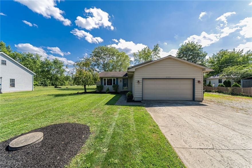 Welcome to this beautifully maintained 4-bedroom, 1.5-bathroom home nestled on nearly half an acre of lush, open
space. This inviting residence features a recently updated AC unit with a heat pump, 5-year-old windows, and
plumbing upgraded in 2020. The roof, only 13 years old and all appliances have been replaced within the past
decade. 

Step inside to discover a modern living room enhanced by a stylish pallet wall, a cozy family room perfect for
relaxing, and brand-new flooring in the upstairs bedrooms. The spacious, partially finished basement offers endless
possibilities for customization. Outside, enjoy a large deck with serene views and perfect for outdoor gatherings.
Additional highlights include a 2-car attached garage, a brand-new hot water tank with warranty, and updated light
fixtures throughout. This home seamlessly combines contemporary updates with comfort and functionality, all
within a generous and private outdoor setting.