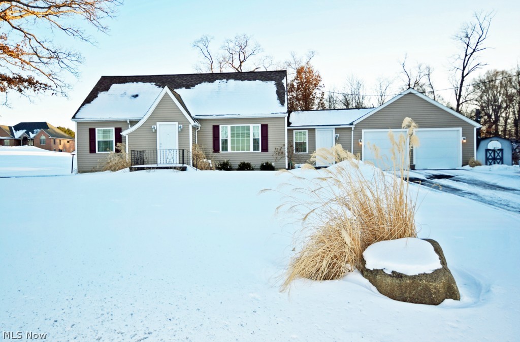 Just what you've been looking for, a quality move-in-ready home in the country on 2.4 acres & over 2,300SF of finished living space. Owners have completely redone this house top to bottom! Brand new kitchen installed 2014, it's beautiful bright & you'll love it! Cabinets are white, new appliances, great looking countertops w/ dimensional edge & laminate wood flooring in the kitchen/dining area which give a prestigious feel. Dining area features a patio door leading out to the deck. The living room with large picture window overlooking the rolling farmland & trees to the north for an awesome scenic view. House sits on 2.4 acres which includes a spacious backyard & treed area to the west which gives this home a very private feel. Spacious bedroom on first floor is currently being used as the master bedroom w/ a second bedroom also on the first floor. Second floor includes one large bedroom which could also be used as a master bedroom & includes a half bath. Finished basement adds approx