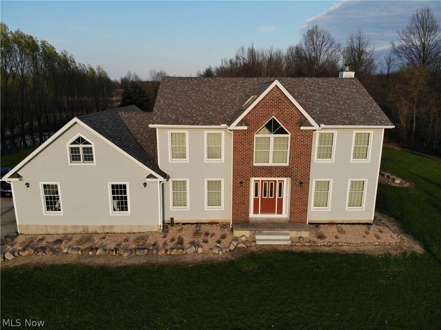 Beautiful custom built 3 bed/3 bath home with 3,000 sq ft of living space on a 4 acre lot. Two story foyer opens to formal dining room and office with tray ceiling. Large eat-in kitchen features center island and opens to great room with wood-burning fireplace with heatlator insert. Walk out to 24x36 multi level deck. First floor also includes laundry and full bath. Spacious master bedroom and master bath with garden style jetted tub, dual sink vanity and two walk-in closets. 2 additional bedrooms and large full bath upstairs. Finished bonus room over garage could be a 4th bedroom. 4 car heated garage with hot/cold water. In-ground 20x40 pool with new liner in 2018. Includes Rominator Caretaker System. Geothermal furnace replaced in 2014, roof replaced in 2013, water heater replaced in 2014. The solid oak flooring, doors and trim complete this custom home.